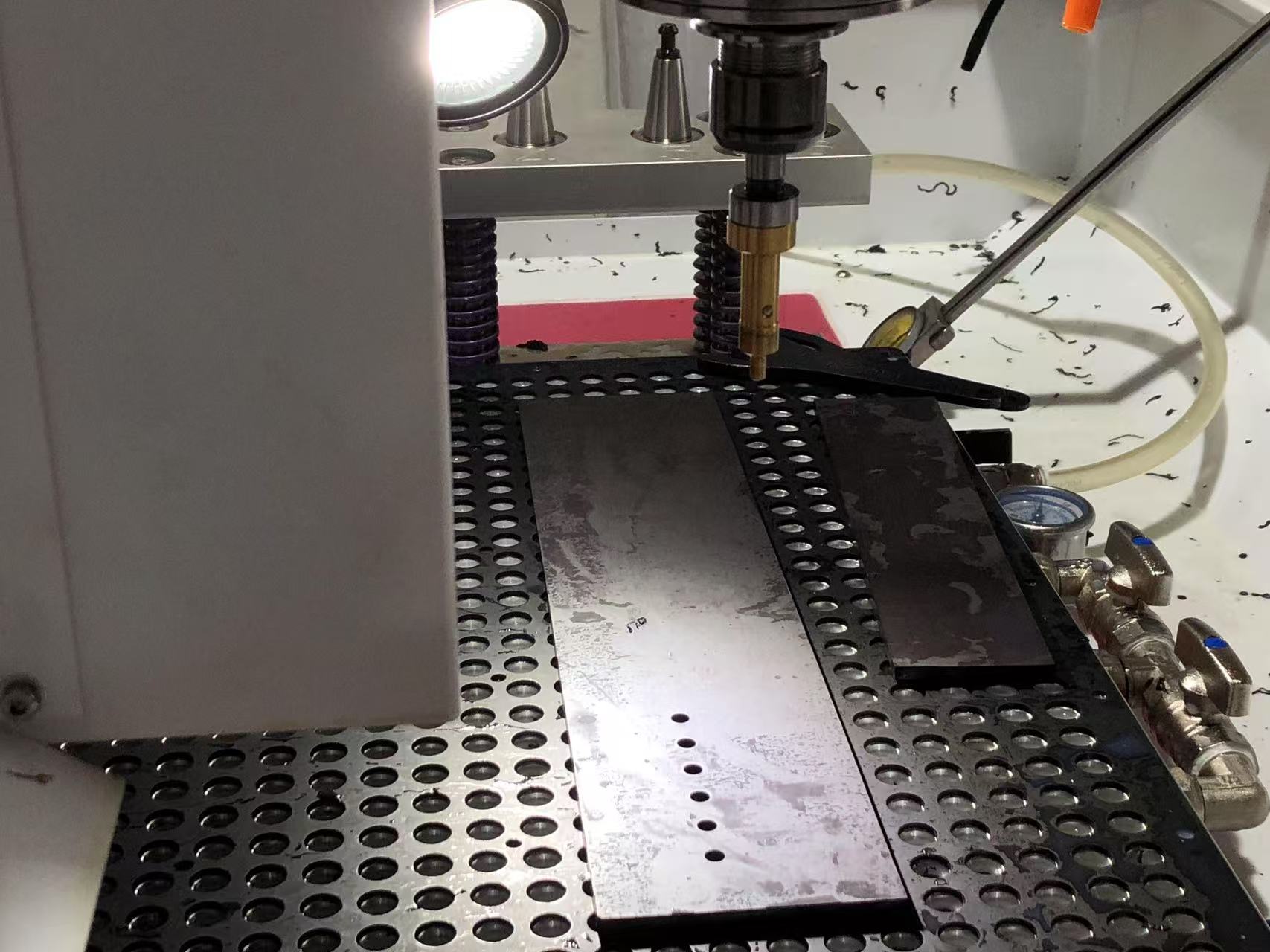 High-Speed CNC Drilling: 3mm Holes in Rubber Sheets
