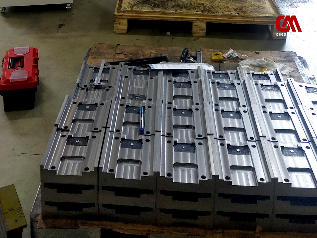 The Duomi four-spindle horizontal CNC drilling and tapping machine is currently performing batch machining of metal components.jpg