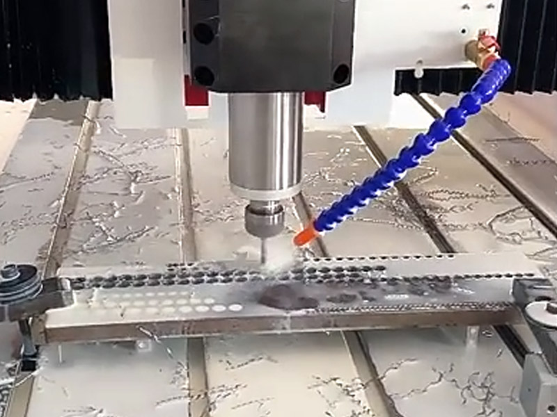 Drilling large holes in stainless steel plates
