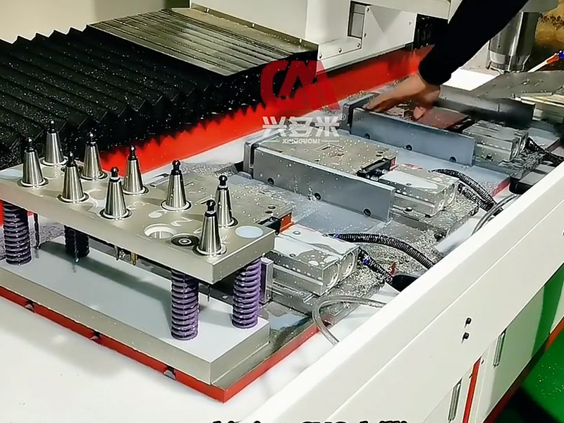 Multi-station multi-process automatic tool change drilling and tapping