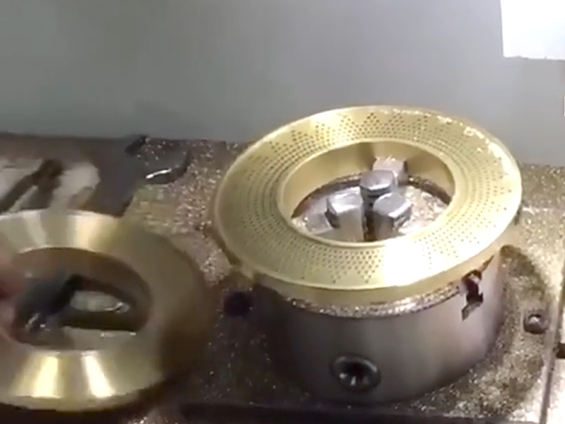 Drilling holes in the copper core of a gas stove