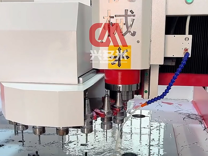 Gantry CNC machine drilling holes on the mold