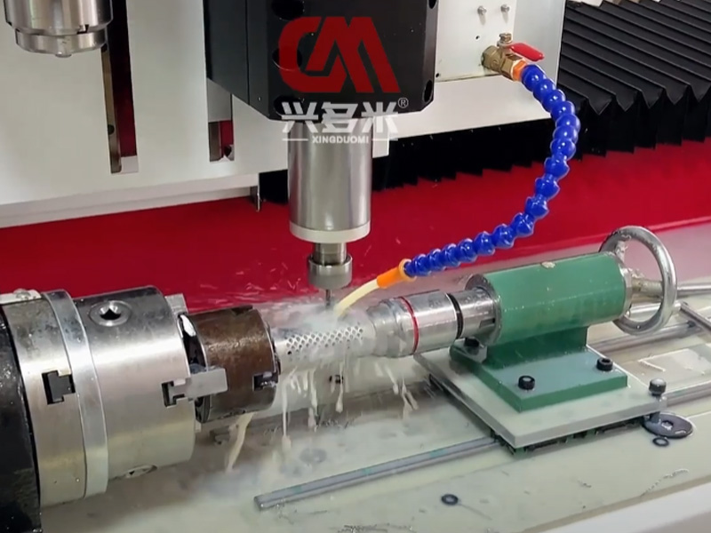 CNC drilling machine drills 3mm small holes on stainless steel round pipes