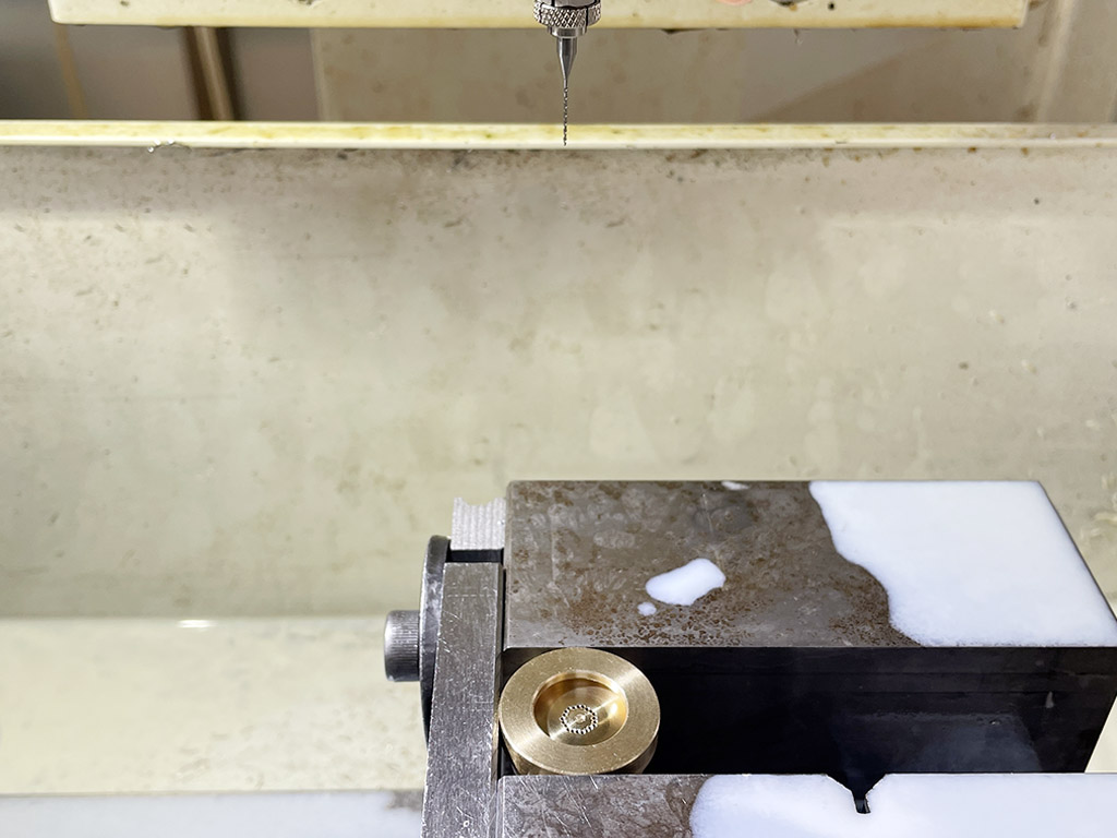 CNC drilling machine drilling micro holes on brass