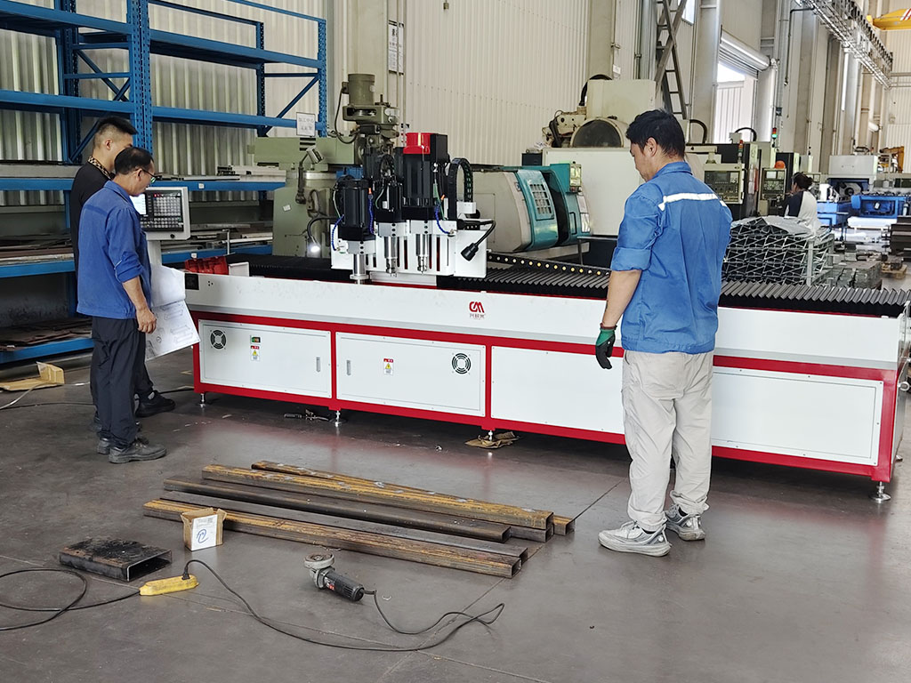 Customer’s production workshop using the DUOMI CNC long metal profile drilling machine