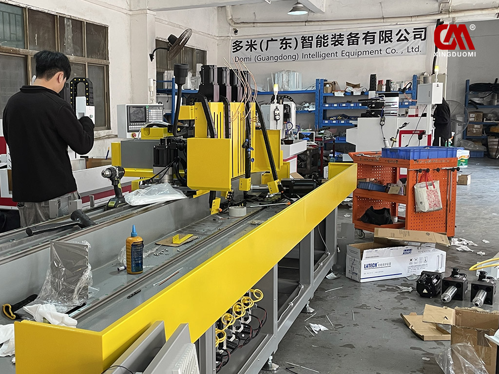 DUOMI CNC is currently manufacturing a four-spindle thermal drilling and tapping machine