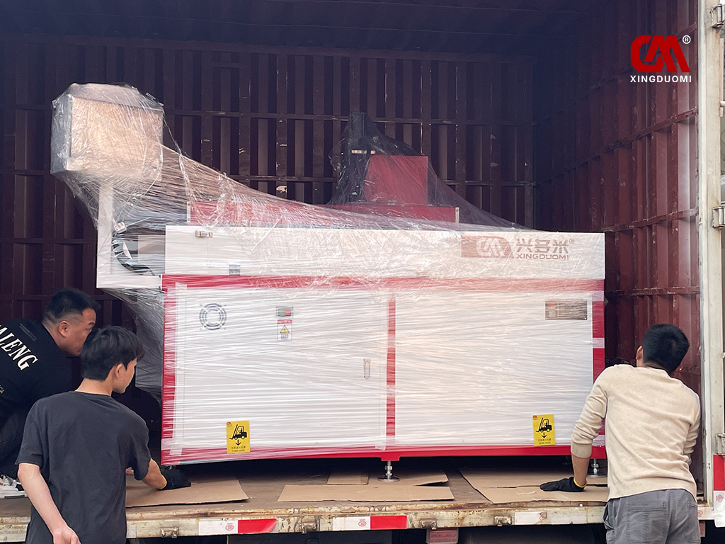Horizontal CNC drilling and tapping machine loaded and shipped to the customer's factory
